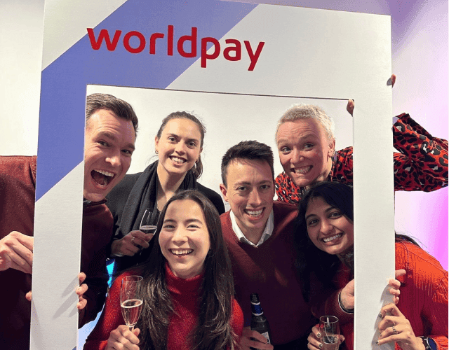 Worldpay sign and red tops